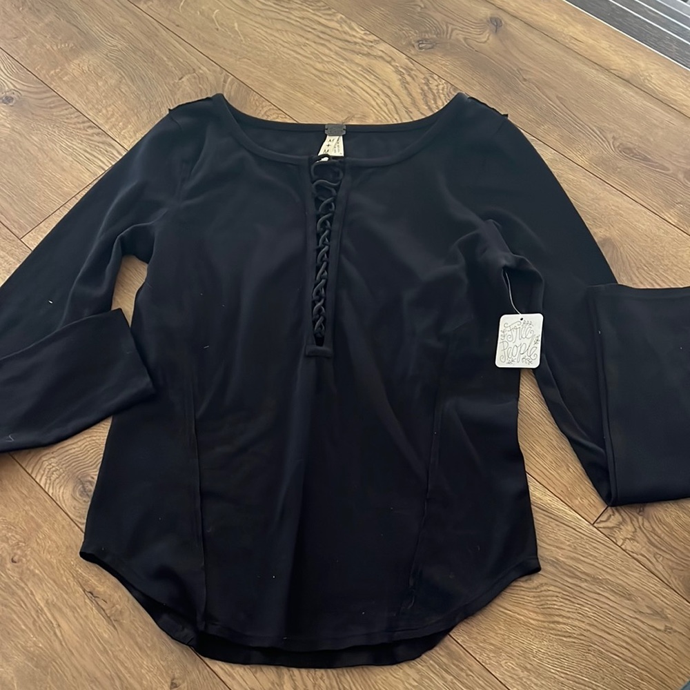 Free people We the Free lace up long sleeve black shirt.